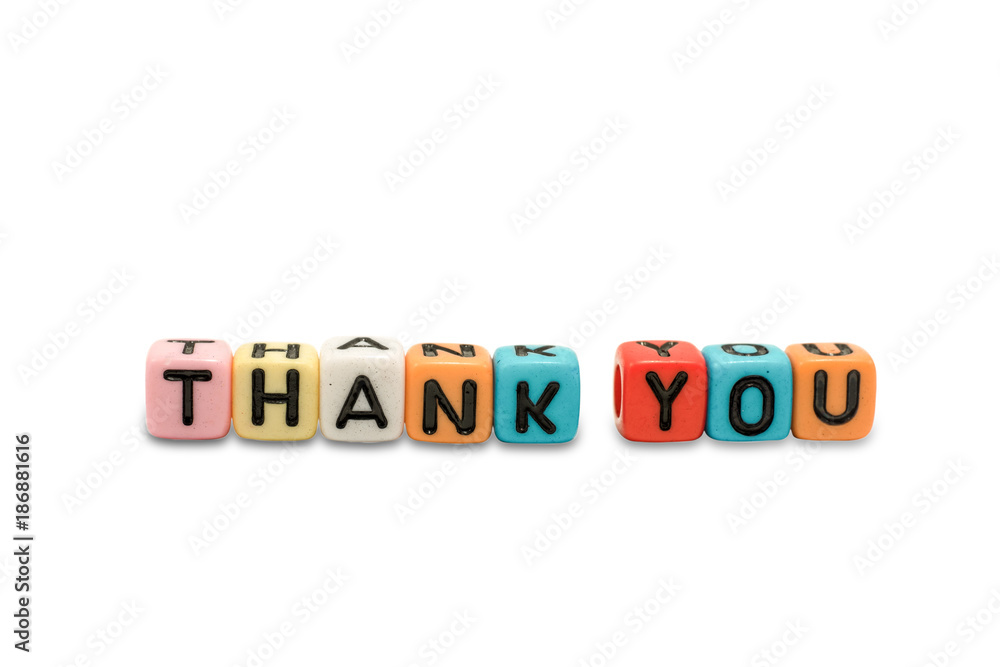 Close up image of the alphabet dices which are arranged for a word THANK YOU, and isolated on white background and the clipping path embedded. Close up image of the alphabet dices which are arranged for a word THANK YOU, and isolated on white background and the clipping path embedded.