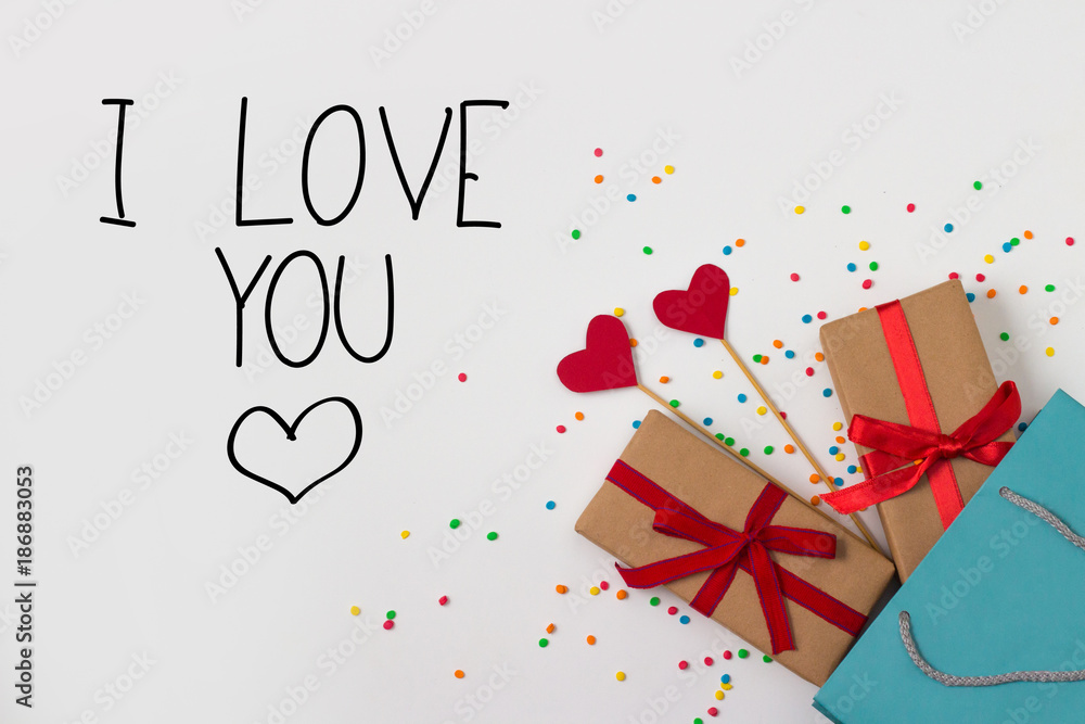 Hearts on Sticks, Two Gifts, Gift Package on the White Background. Added text I Love You. Hearts on Sticks, Two Gifts, Gift Package on the White Background. Added text I Love You.