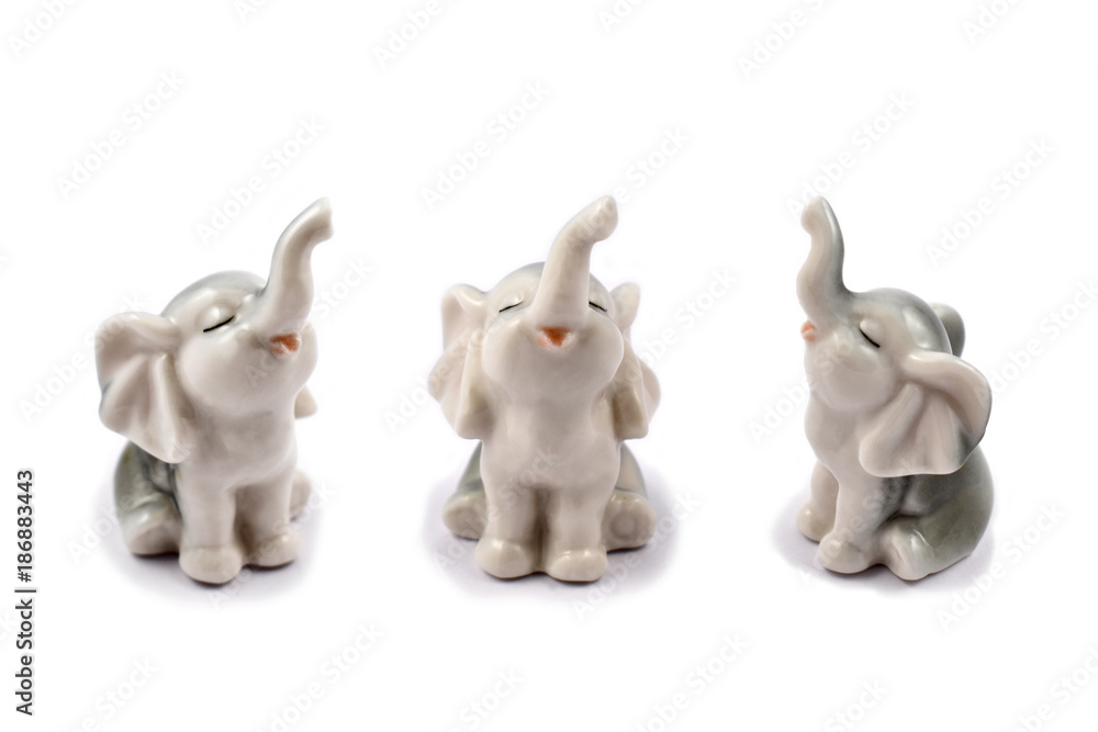 Naklejka premium Figurine elephant stock images. Elephant on a white background. Set of cute elephants