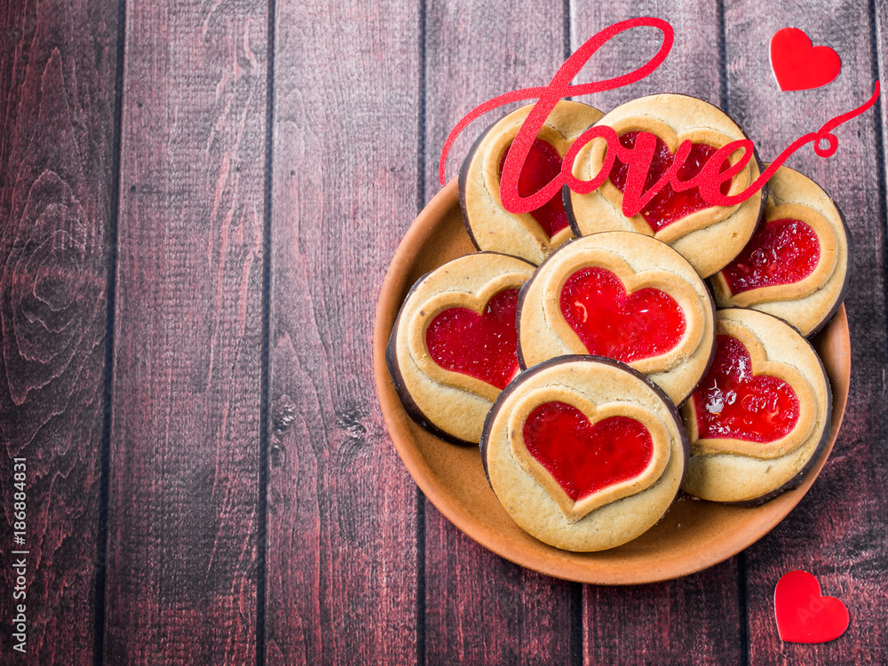 Homemade Cookies with a Red Jam Heart Valentine's Day Dark Wooden Background Copy Space Homemade Cookies with a Red Jam Heart Valentine's Day Dark Wooden Background Copy Space
