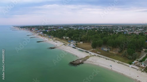 Wallpaper Mural 
4K Aerial. Summer sea coast  beach with  houses 
 Torontodigital.ca