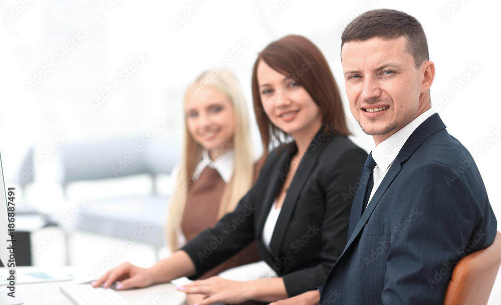 closeup of business people sitting at a meeting the conference room. closeup of business people sitting at a meeting the conference room.