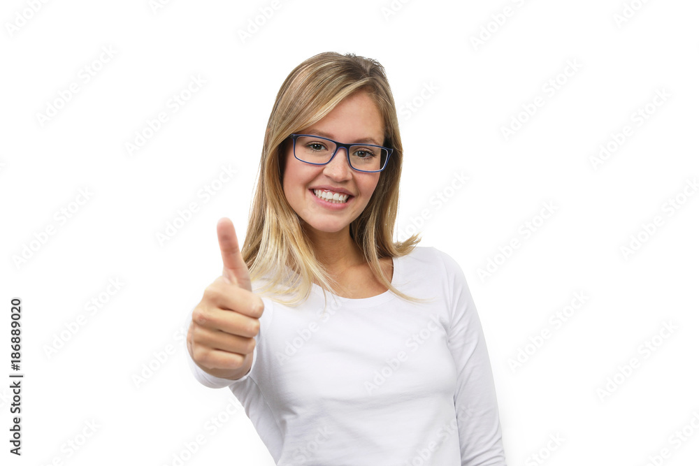 Hübsche blonde Frau mit Brille lacht und Daumen hoch Hübsche blonde Frau mit Brille lacht und Daumen hoch