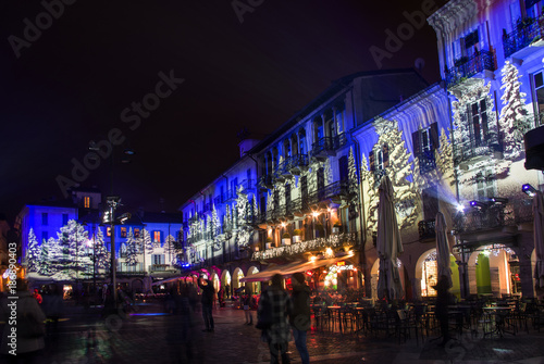 bars and restaurants with Christmas illuminations in the famous Como's square. Italy © gpriccardi