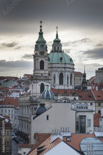 St. Nicholas Church viewed from Lesser Town Bridge Tower, Lesser Town, Prague, Czech Republic © klevit