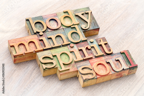 Photography body, mind, spirit and soul word abstract in wood type