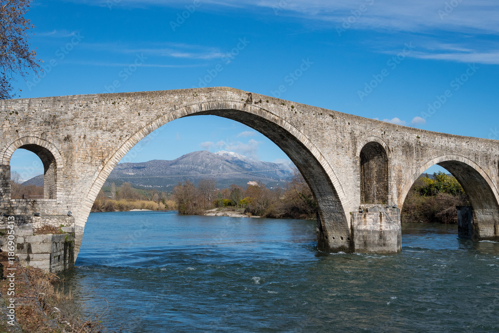 Bridge of Arta in Greece. A stone bridge that crosses the Arachthos river in the west of the city of Arta. The folk ballad 