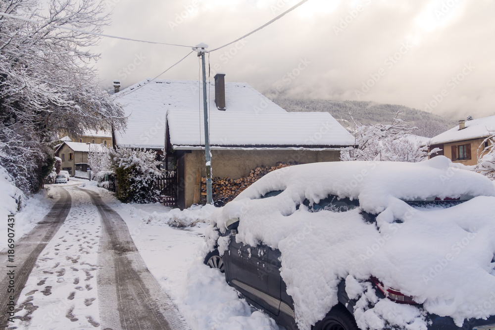 Car buried under the snow