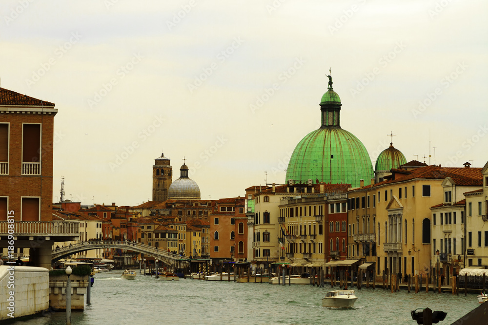 Views of canals and ancient architecture of Venice.
