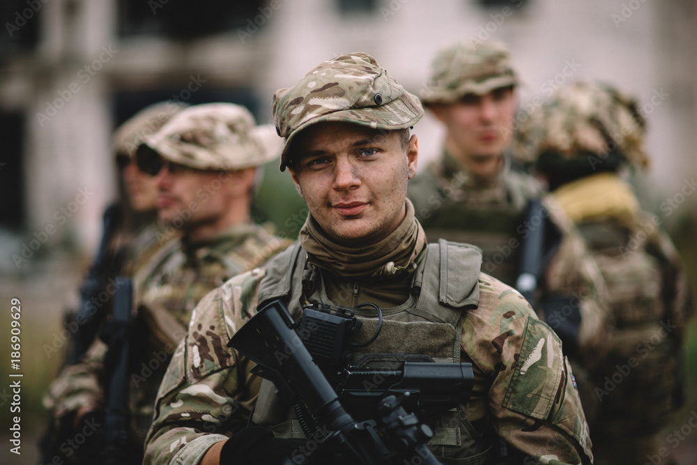 Army sniper during the military operation in the city. war, army, technology and people concept. Army sniper during the military operation in the city. war, army, technology and people concept.