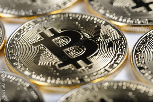 Macro view of shiny Bitcoin souvenire coins photo