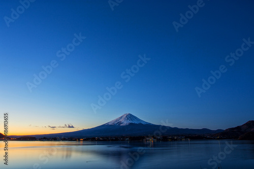the mountain Fuji at dawn with peaceful lake reflection