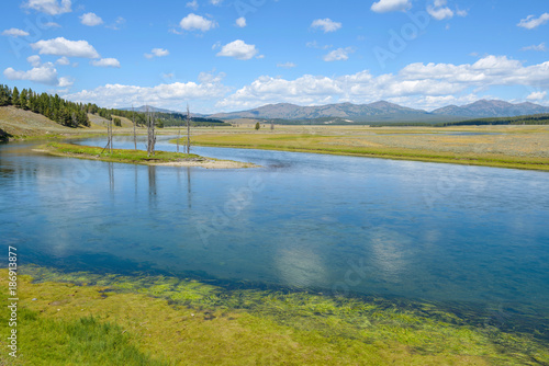 Yellowstone River - Colorful and calm Yellowstone River at Hayden Valley, Yellowstone National Park, Wyoming, USA.