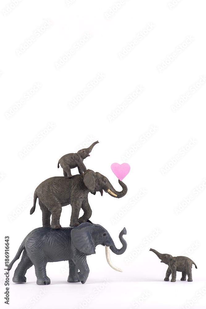 elephants in love on white background with hearts and family for valentines day  plenty of room for type