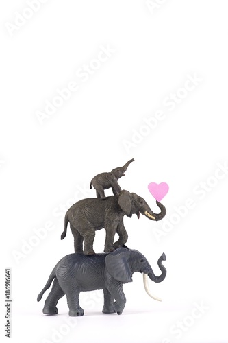 elephants in love on white background with hearts and family for valentines day plenty of room for type