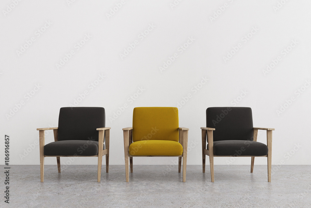 Black and yellow armchairs in an empty room Black and yellow armchairs in an empty room