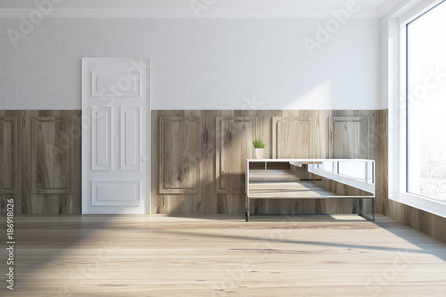 Glass chest of drawers in a wooden living room