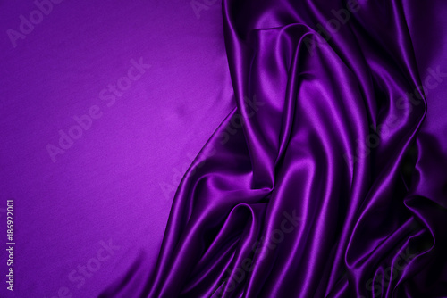 Purple fabric background and texture, Crumpled of violet satin for abstract