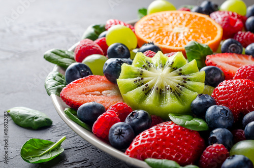 Fruit platter with various fresh strawberry  raspberry  blueberr