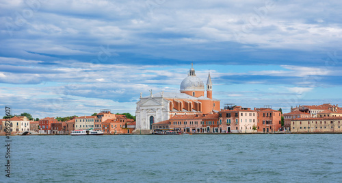 Redentore Church on Giudecca Island in Venice Lagoon with clouds
