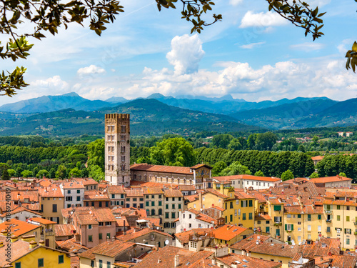 Lucca Italy landscape travel rooftops with mountains in background