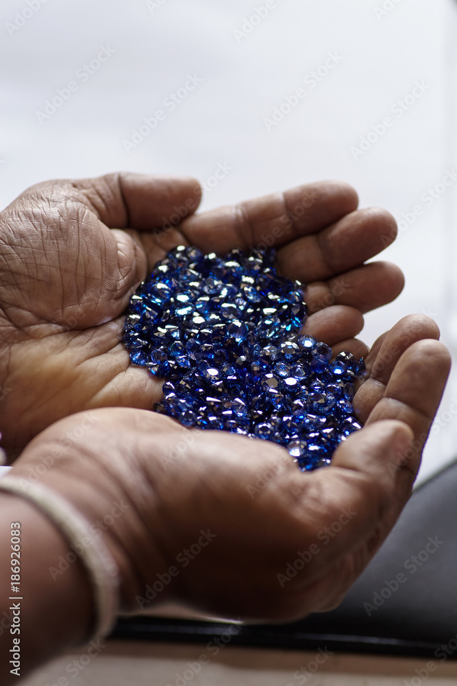 Natural mineral gem stones supphirus on the background Natural mineral gem stones supphirus on the background