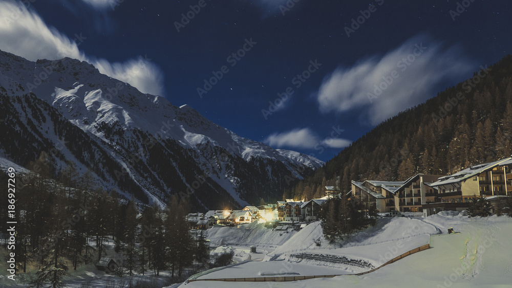 Beautiful night scenery of popular ski resort Solda (Sulden), candid vintage photography