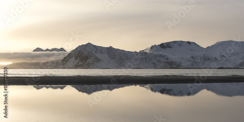 Reflection of mountain in water during sunset, Lofoten, Nordland, Norway