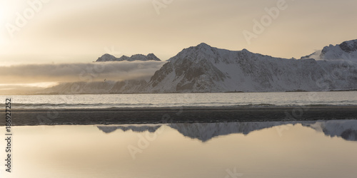 Reflection of mountain in water during sunset, Lofoten, Nordland, Norway
