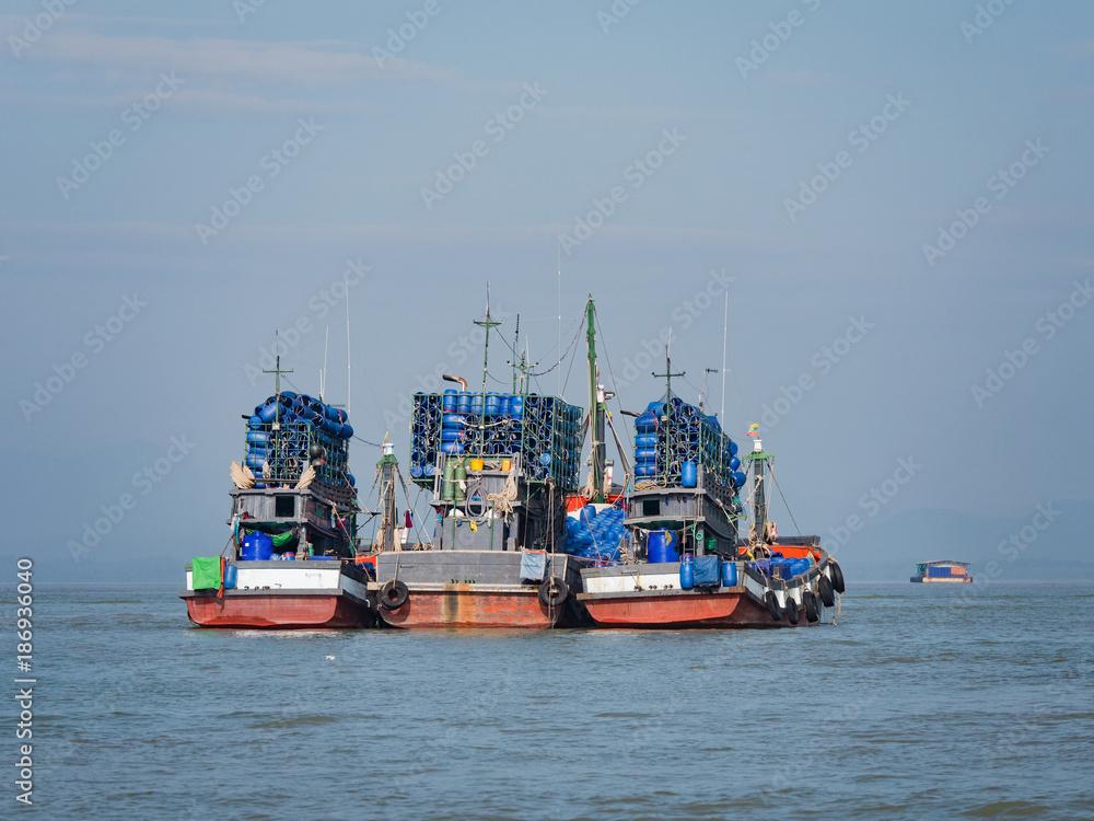 Naklejka premium Fishing boats in Myeik, Myanmar