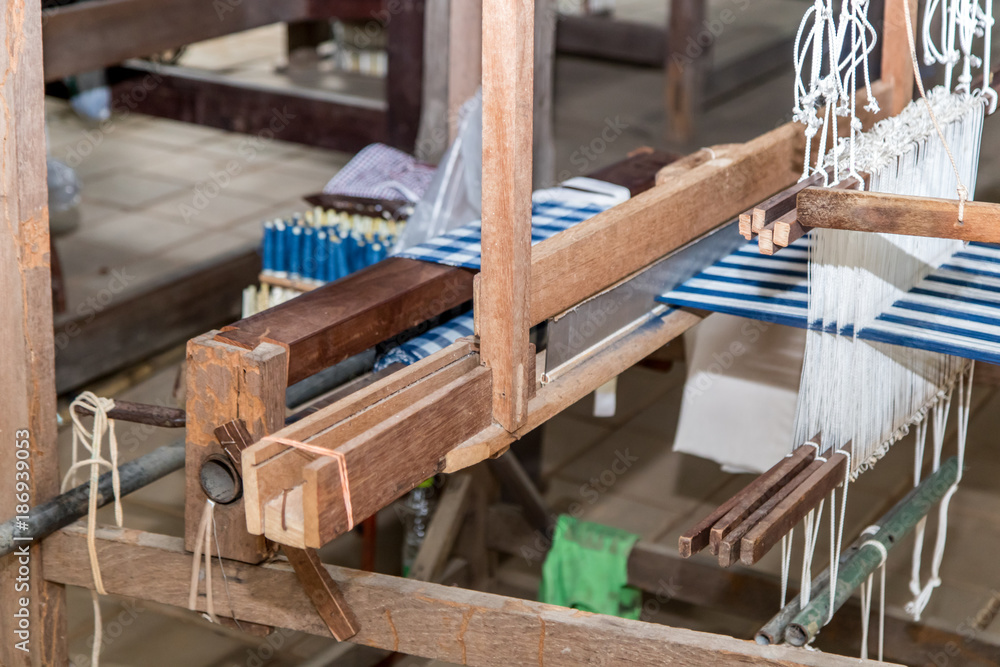 old weaving loom in workshop, Thailand old weaving loom in workshop, Thailand
