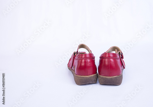 shoe or red colour woman shoes on background.