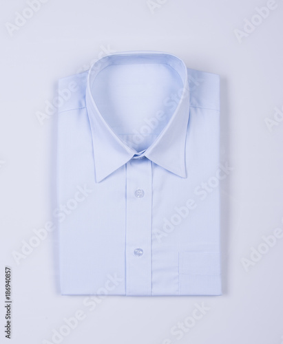 Shirt or men dress shirt on background.