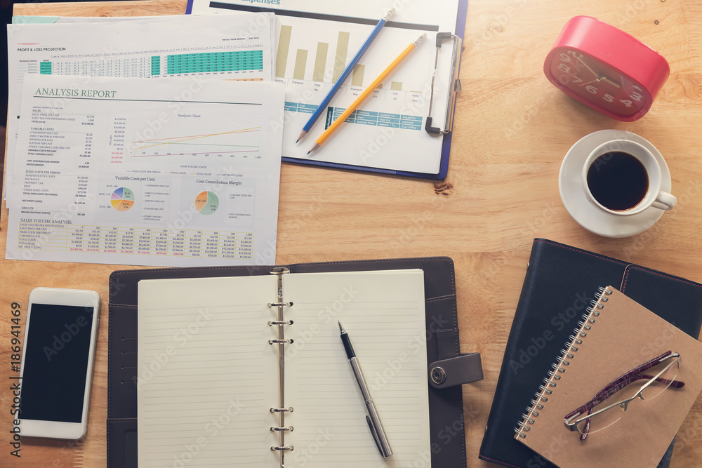 Business and finance concept of office working, Office desk in working day. Business and finance concept of office working, Office desk in working day.