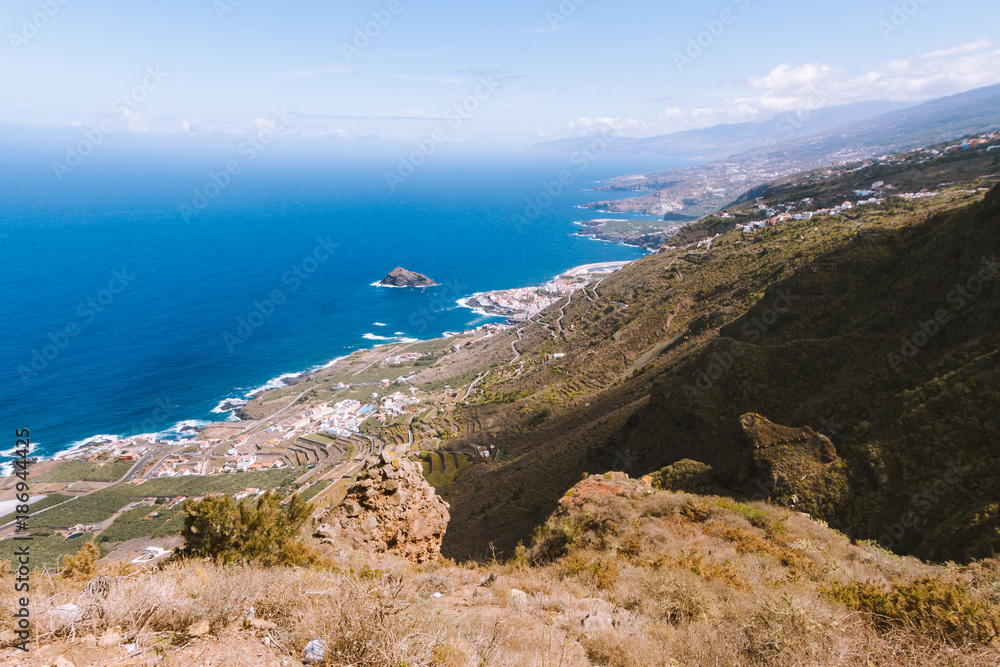 Beautiful coastline with villages on hillside on sunny day Beautiful coastline with villages on hillside on sunny day