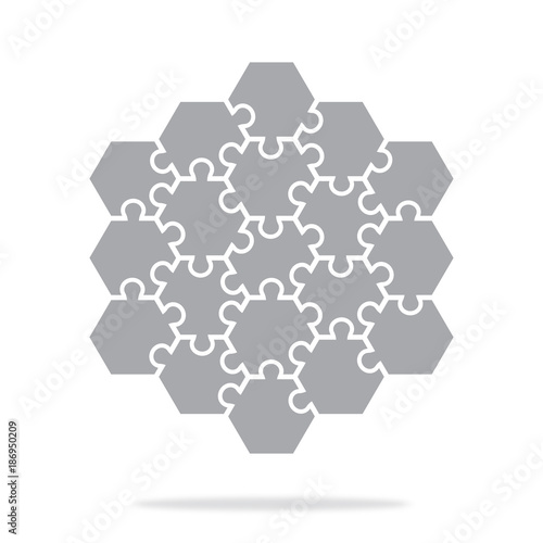 Simple icon hexagonal puzzles in gray. Simple icon puzzle of the nineteen elements. Flat design. Vector illustration EPS10.