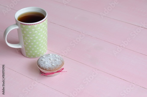 Muffin with hearts and cup of tea © Moseva_Alena
