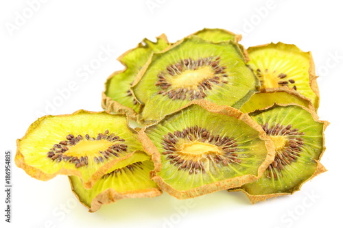 dried slices of green kiwi fruits isolated on a white background