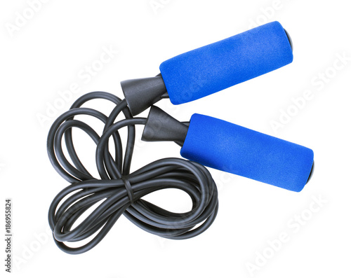 Blue jump rope or skipping rope isolated on white background. Sports, fitness, cardio, martial art and boxing accessories. Top view photo