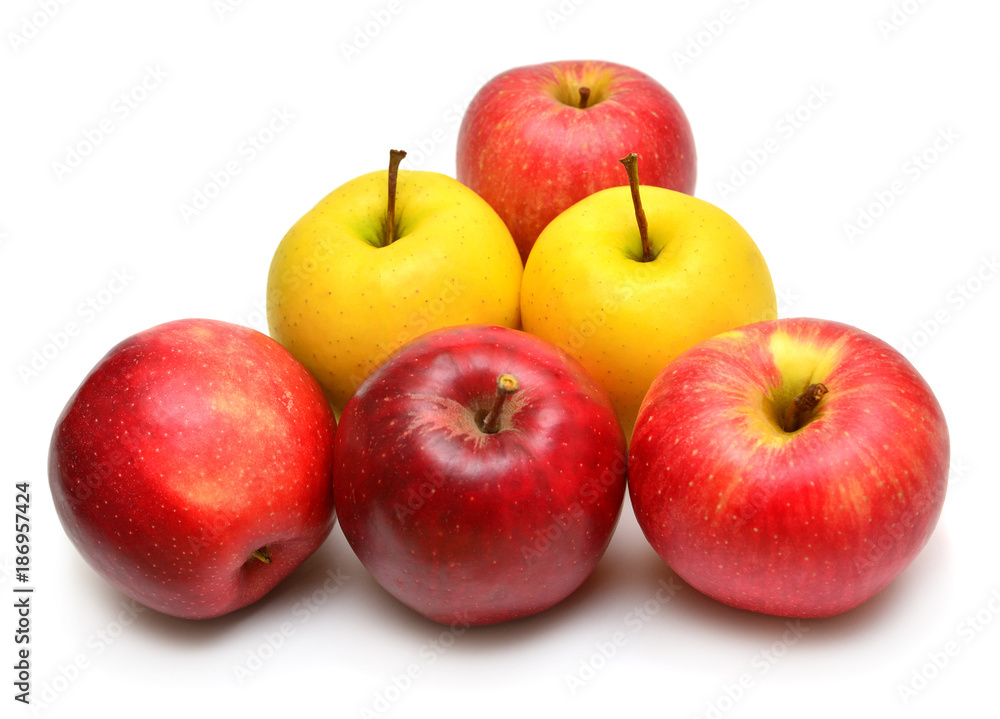 Apples beautiful red and yellow varieties Champion and Golden Delicious isolated on white background. Triangle, billiards, balls. Flat lay, top view Apples beautiful red and yellow varieties Champion and Golden Delicious isolated on white background. Triangle, billiards, balls. Flat lay, top view