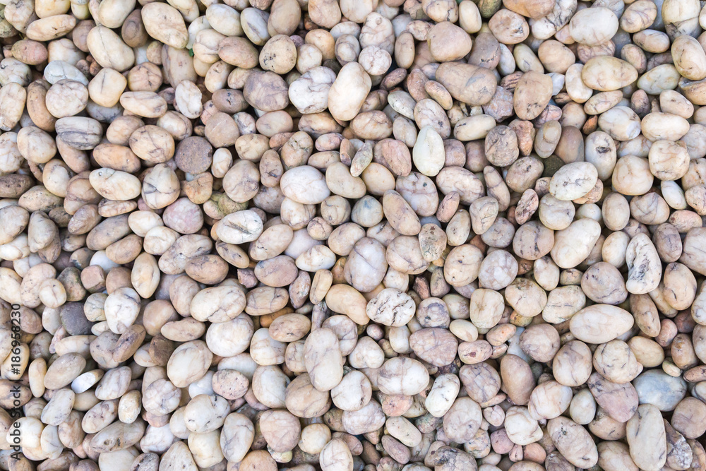 Stone pebbles texture or stone pebbles background for interior design business. exterior decoration and industrial construction idea concept design. stone pebbles motifs that occurs natural. Stone pebbles texture or stone pebbles background for interior design business. exterior decoration and industrial construction idea concept design. stone pebbles motifs that occurs natural.