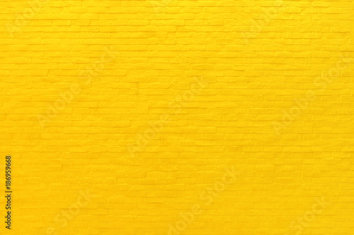 Yellow brick wall texture and background