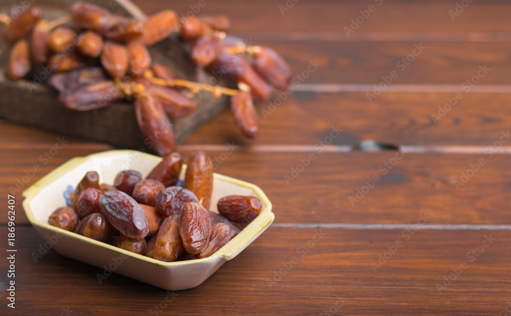 dried dates on a grey background dried dates on a grey background