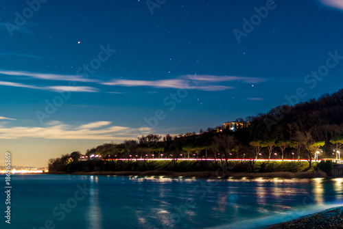 Night view of coast of Garda lake 