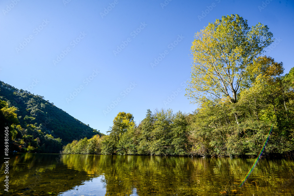 beautiful and colorful river mountain autumn fall season landscape sunset