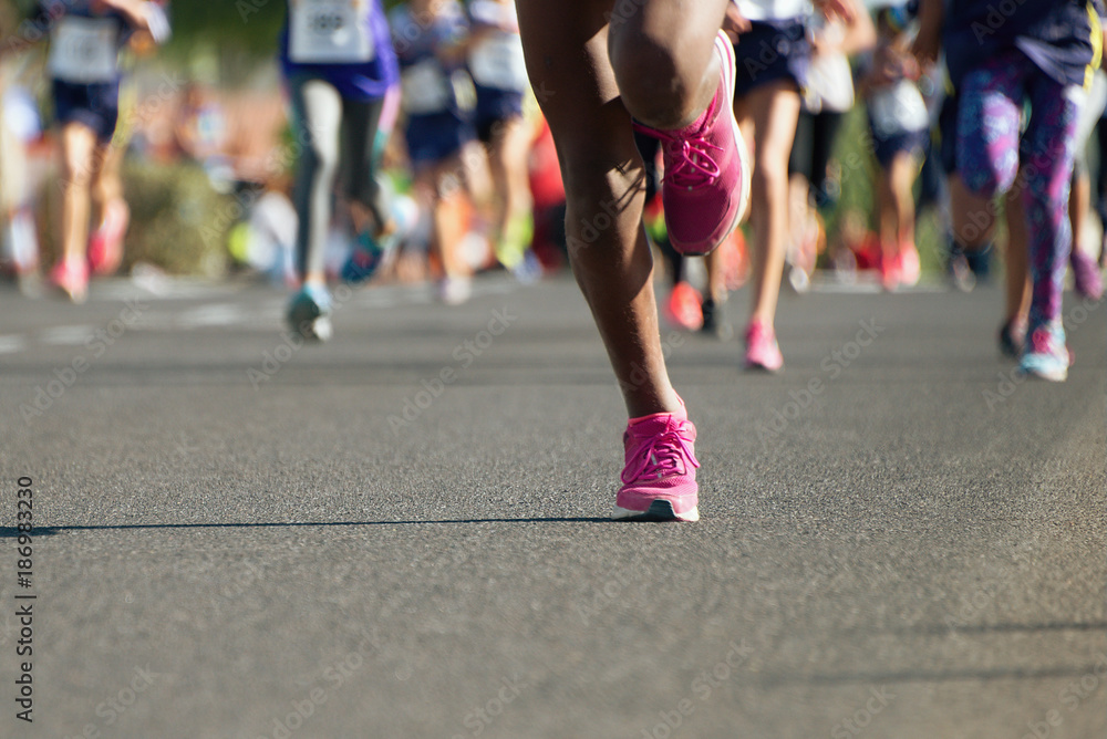 Running children, young athletes run in a kids run race