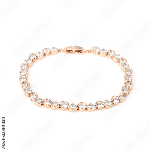 Golden diamond bracelet isolated on white