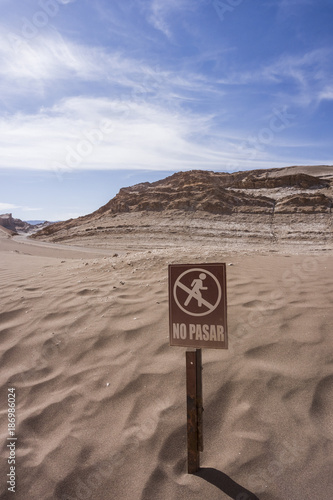 Chile, San Pedro de Atacama, no trespassing sign in Atacama desert photo