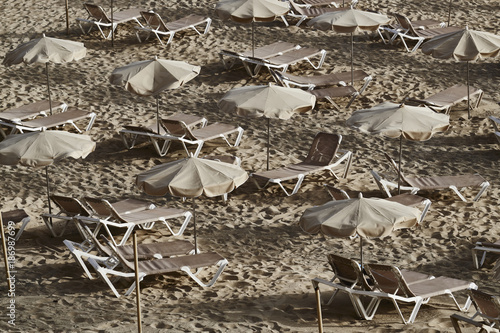 Spain, Canary Islands, Fuerteventura, Morro Jable, beach with sunshades and sun loungers photo