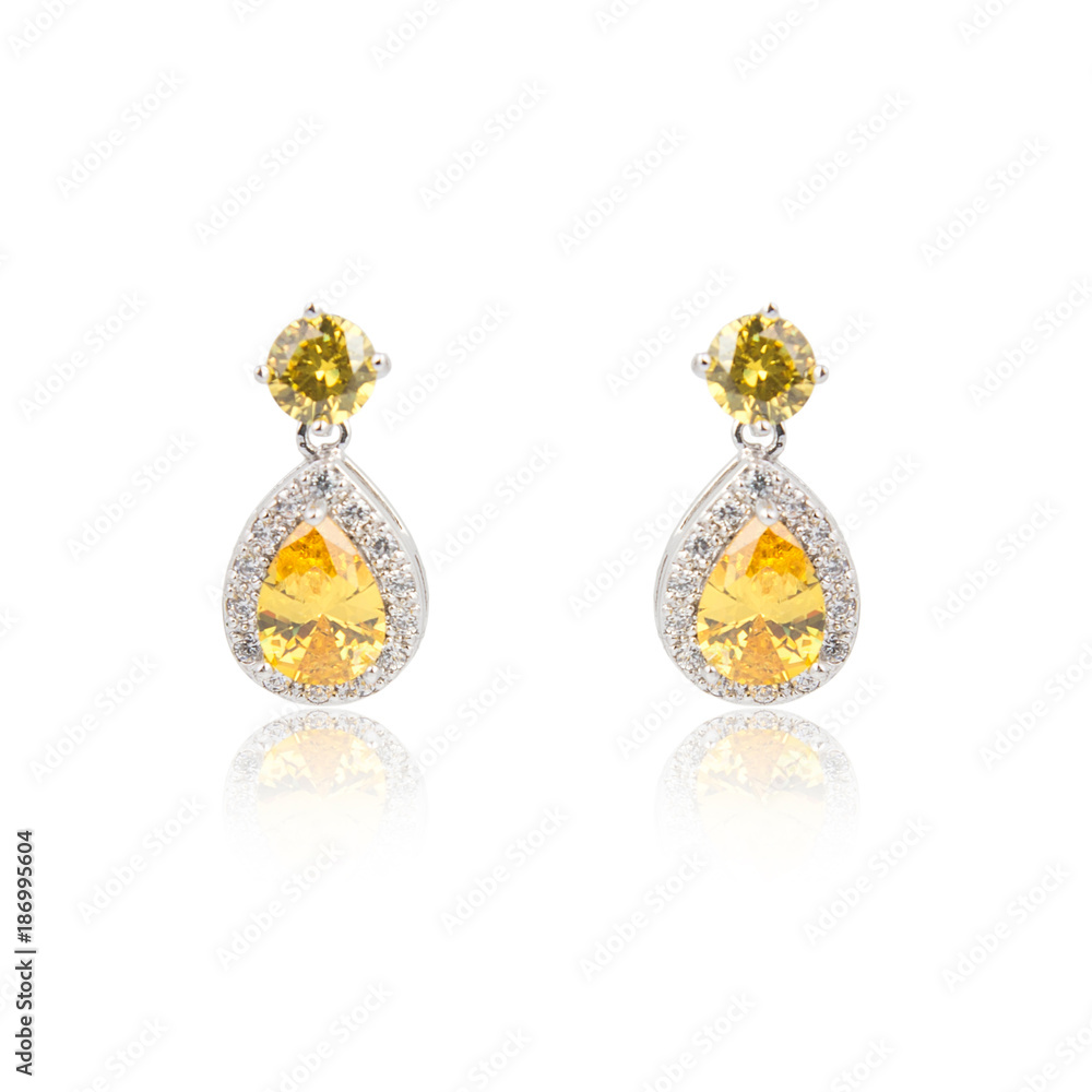Pair of topaz diamond earrings isolated on white Pair of topaz diamond earrings isolated on white